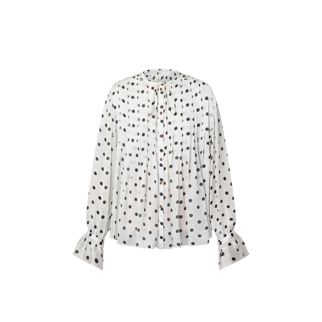 White polka dot store blouse